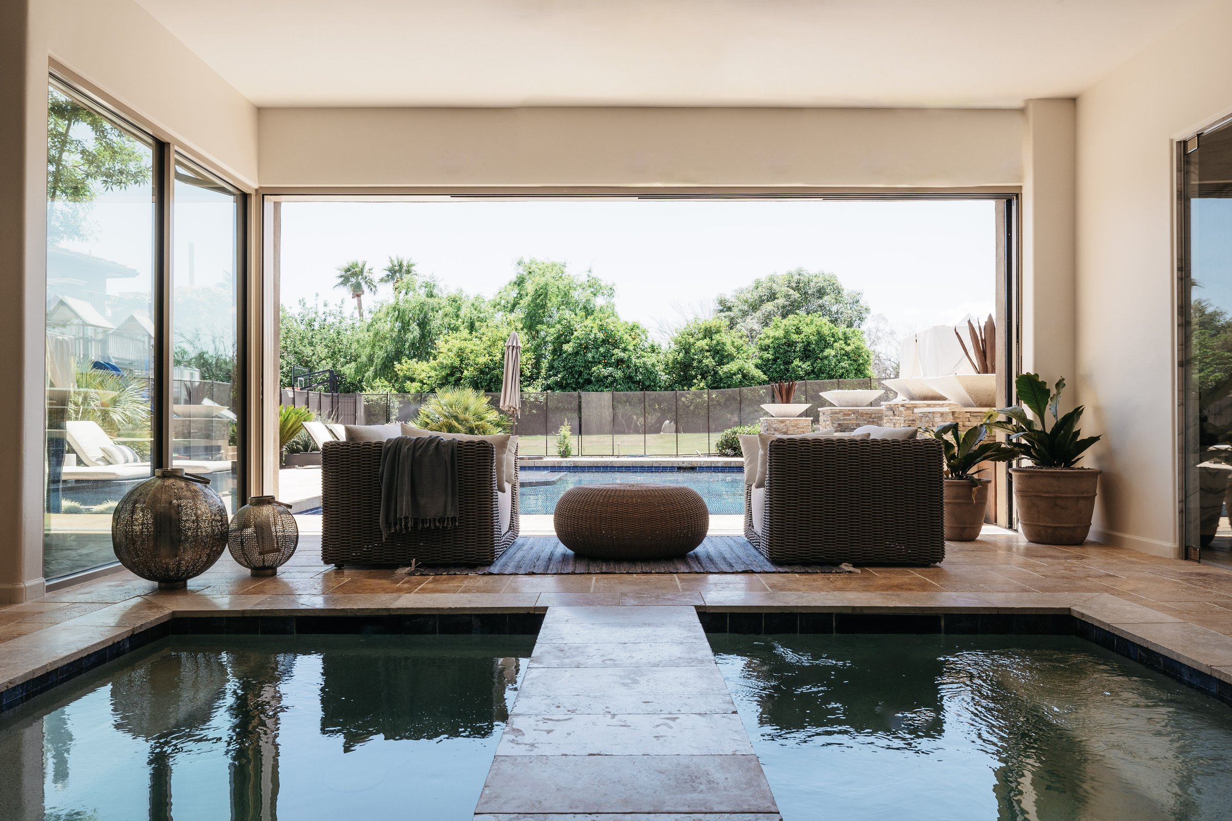 Exhale spa, cold plunge with travertine and indoor-outdoor view