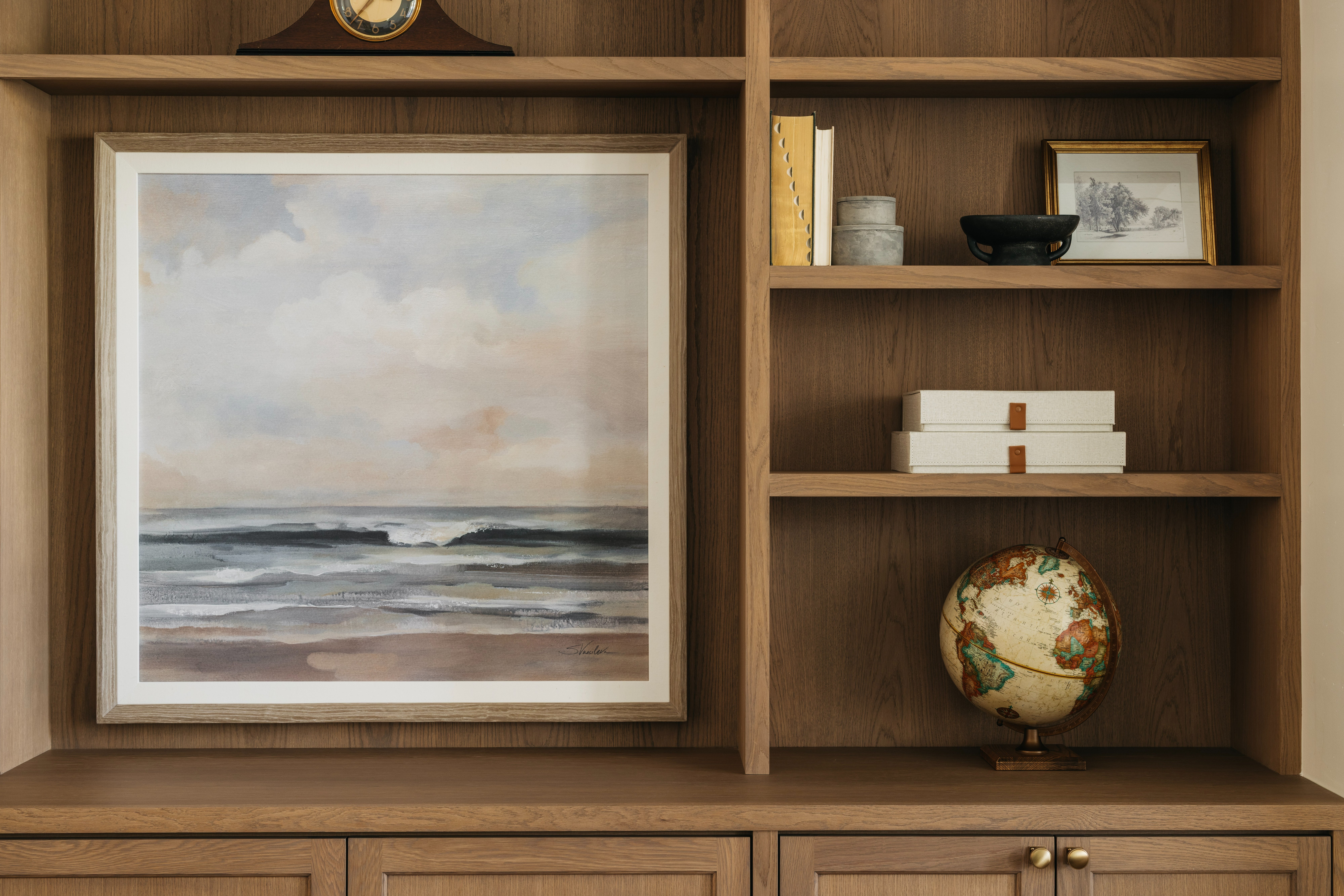 Office built-in detail with seascape painting and globe, Heirloom House