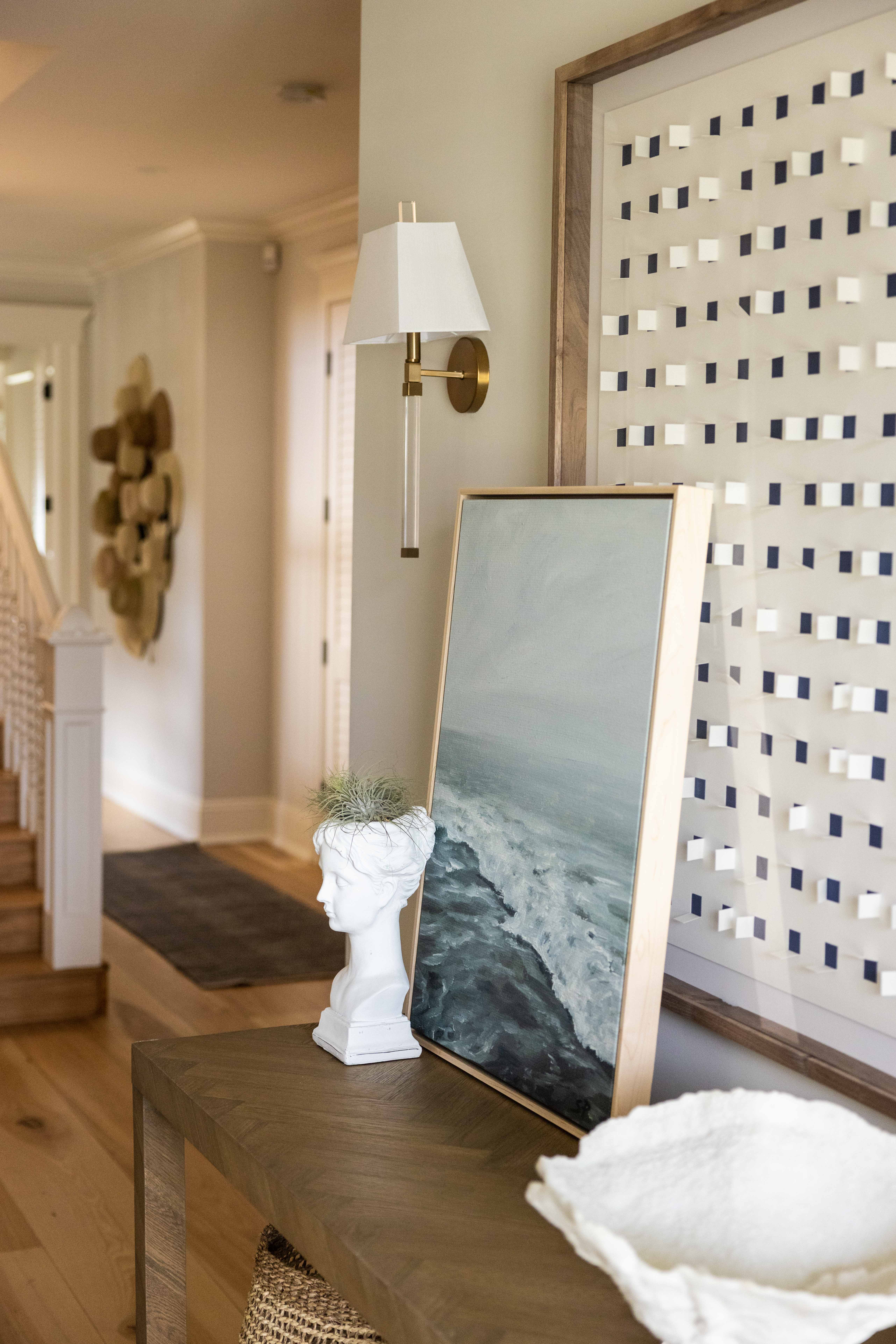 Entry detail with sconce and art, Seaside Retreat