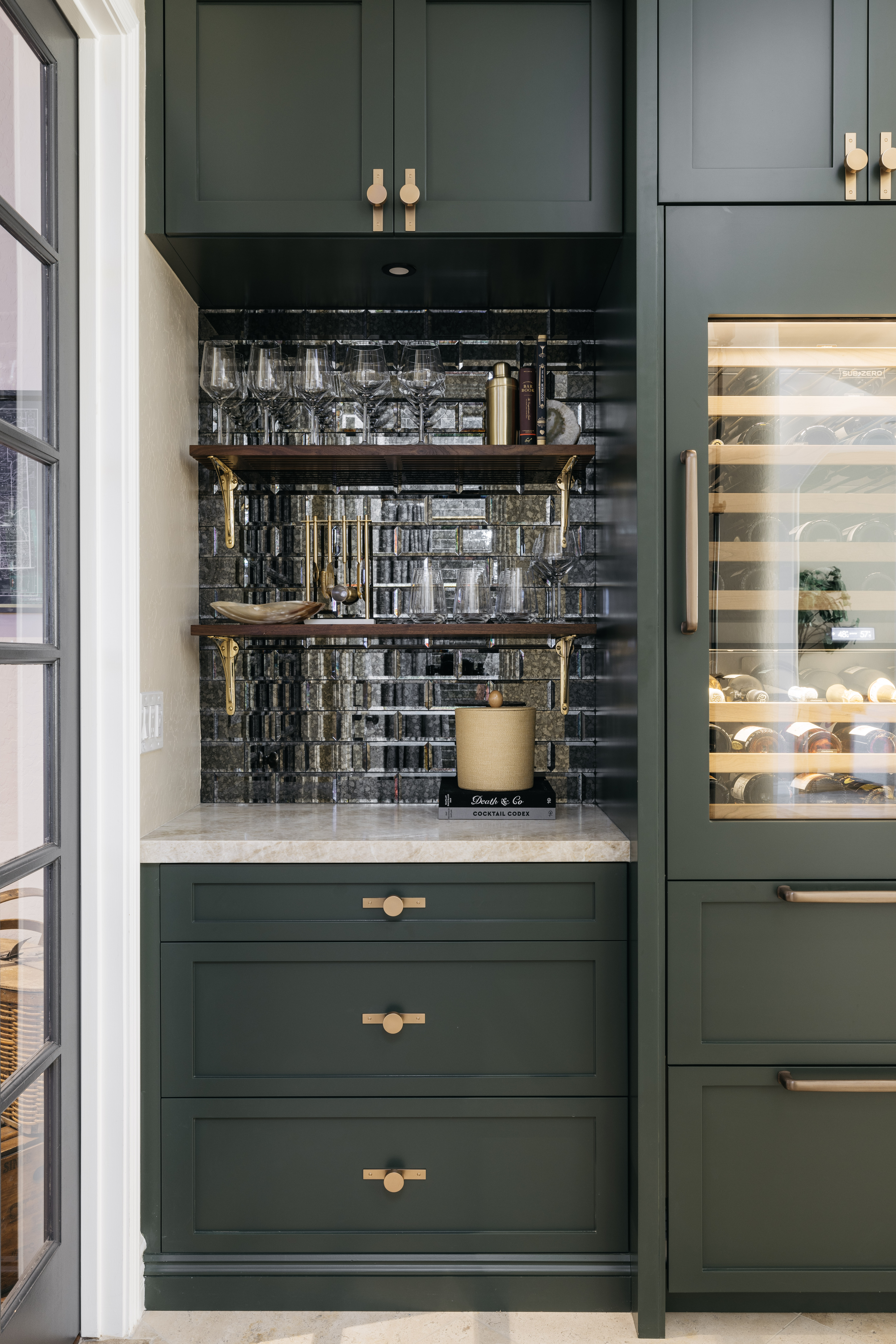 Wet bar with mirrored tile and wine fridge, The Considered Home