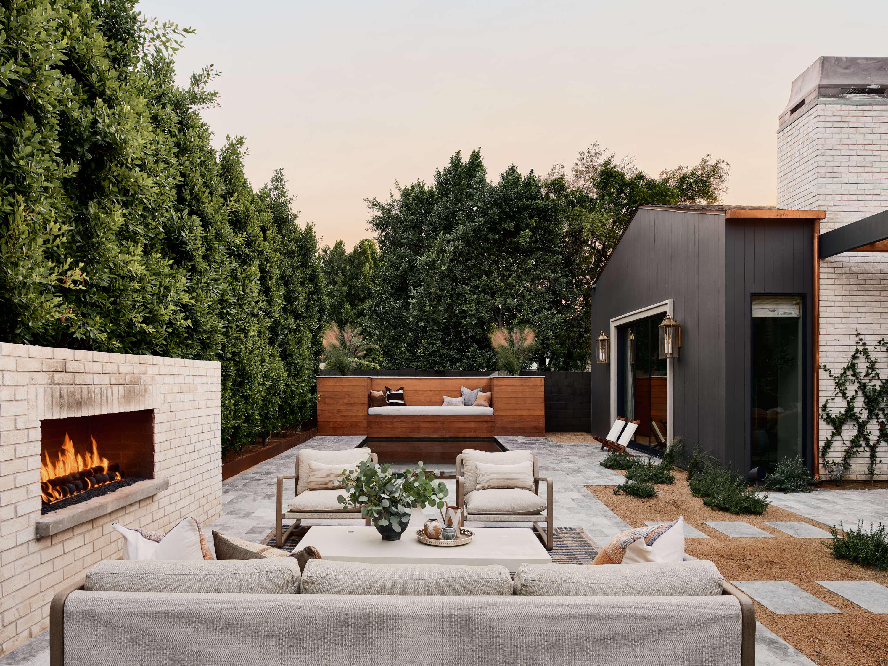 Backyard fireplace and seating